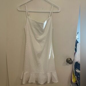 White Sleeveless Dress with Ruffle Hem